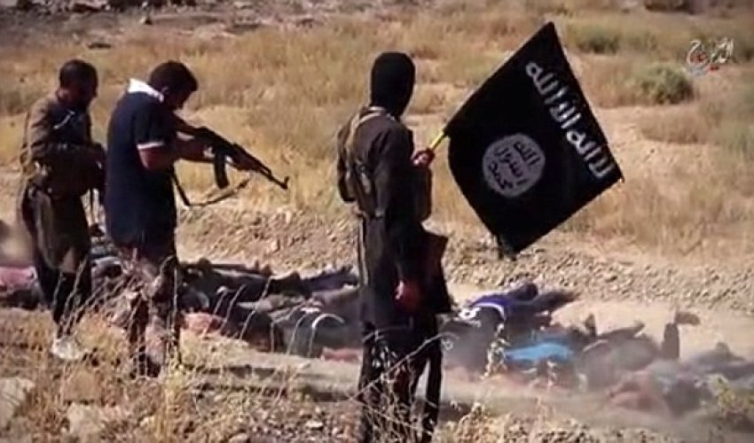 ISIS child executioner ignores prisoners' pleas to spare them