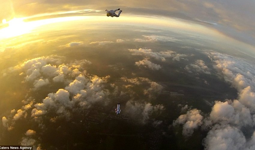 Stunning pictures capture moment skydivers soar over the planet