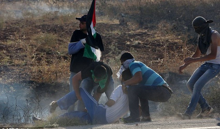 Palestinian youth shot dead by Israeli troops during protest