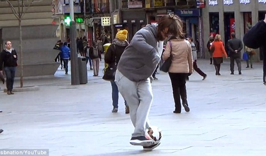 Cristiano Ronaldo disguised as bearded homeless man pulling freestyle tricks