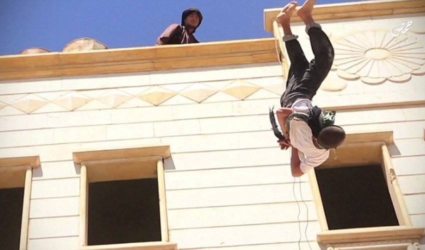 Two gay men are thrown off tall building by ISIS Two gay men are thrown off tall building by ISIS