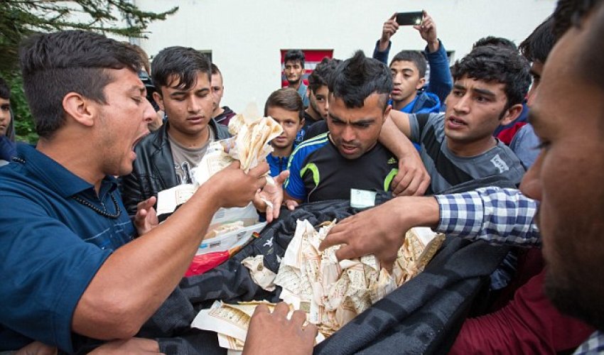 Riot breaks out at overcrowded refugee camp in Germany after resident tore pages out of the Koran Riot breaks out at overcrowded refugee camp in Germany after resident tore pages out of the Koran