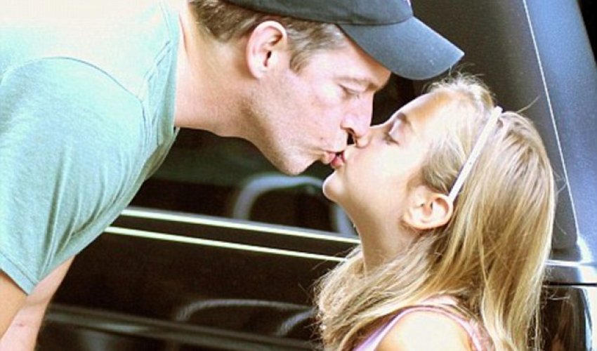 Psychologist slams doctor's advice not to kiss their children on the lips