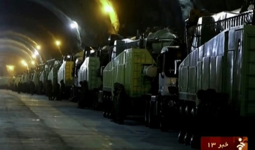 Iran reveals underground tunnel filled with missile launchers