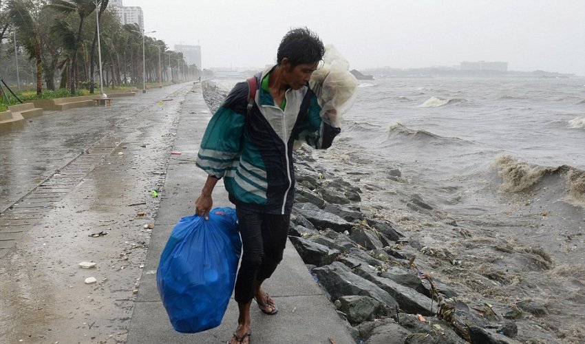 Typhoon ploughs into Philippines killing two people and leaving 23,000 more without homes