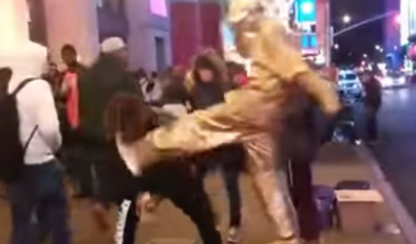 Human statue flies into action after getting robbed