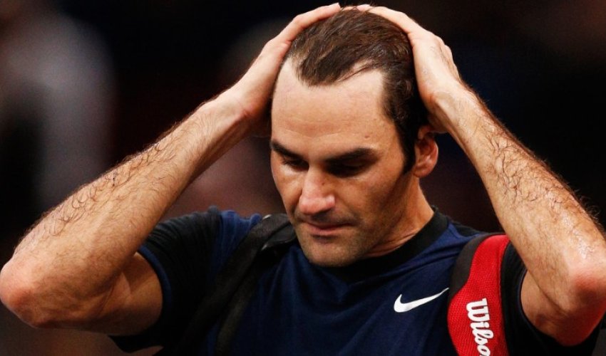 Roger Federer knocked out in Paris by John Isner's power