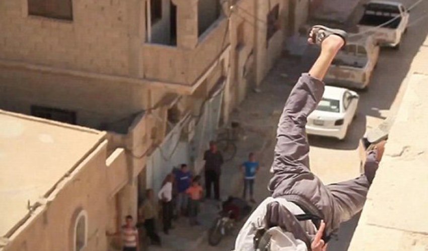 ISIS executes boy, 15, by throwing him off a roof – because he's gay ISIS executes boy, 15, by throwing him off a roof – because he's gay