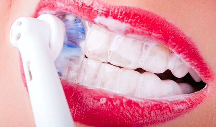 How your electric toothbrush can DESTROY your teeth