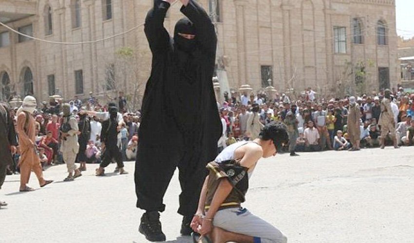 ISIS beheads 15-year-old boy for listening to western music ISIS beheads 15-year-old boy for listening to western music