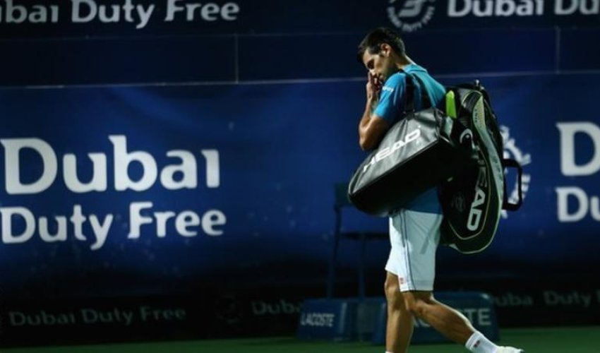 Novak Djokovic retires from Dubai quarter-finals with eye problem