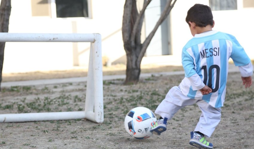 Family of Afghan boy with plastic Messi jersey flees to Pakistan