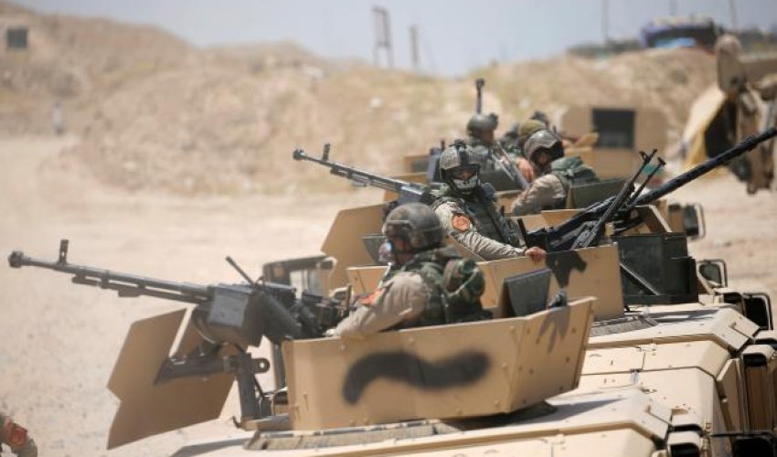 Iraqi forces clash with Islamic State near Falluja, bombard city center