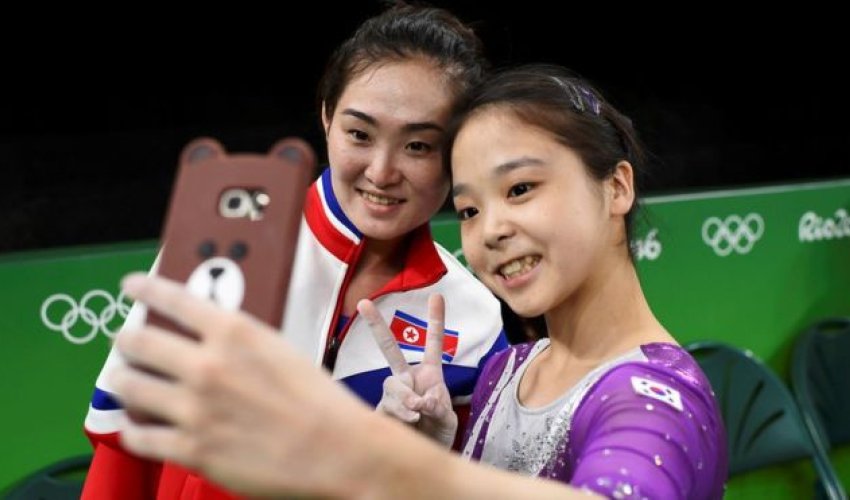 North and South Korean gymnasts pose for Olympic selfie