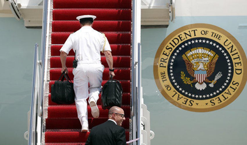 Trampın nüvə çantası mühafizəçiləri dalaşdırdı