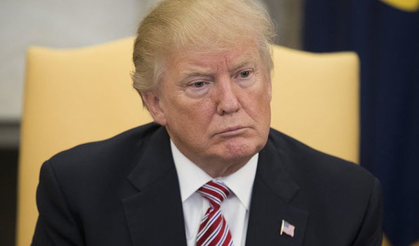 Tramp miqrantlara görə məhkəməyə verildi