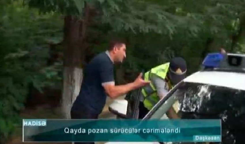 Sürücü polisə: “Yazma” dedim, yekə kişisən – Video