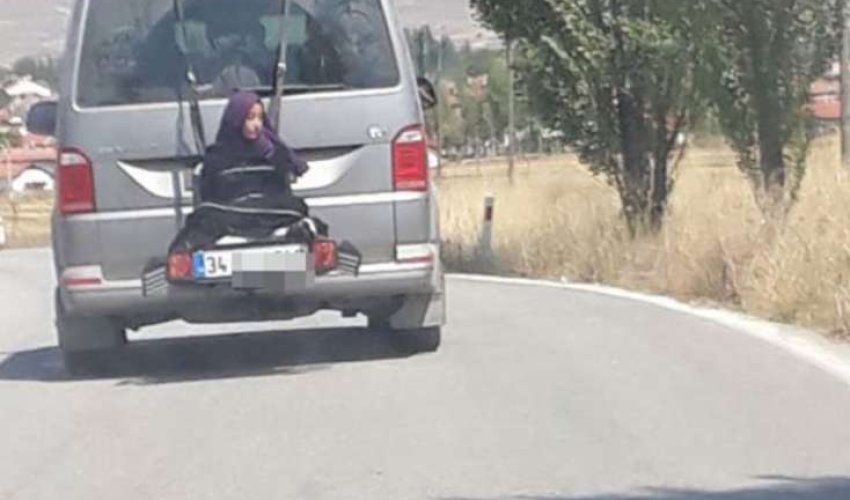Qızı yük kimi avtobusun arxasına bağlayıb... - VIDEO Qızı yük kimi avtobusun arxasına bağlayıb... - VIDEO