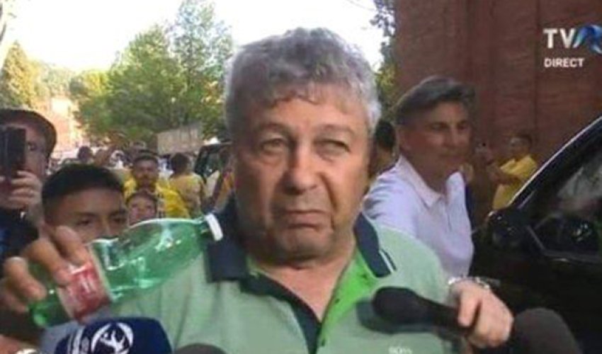 Bu dəfə mikrofon yerinə, su butulkası uzadıldı