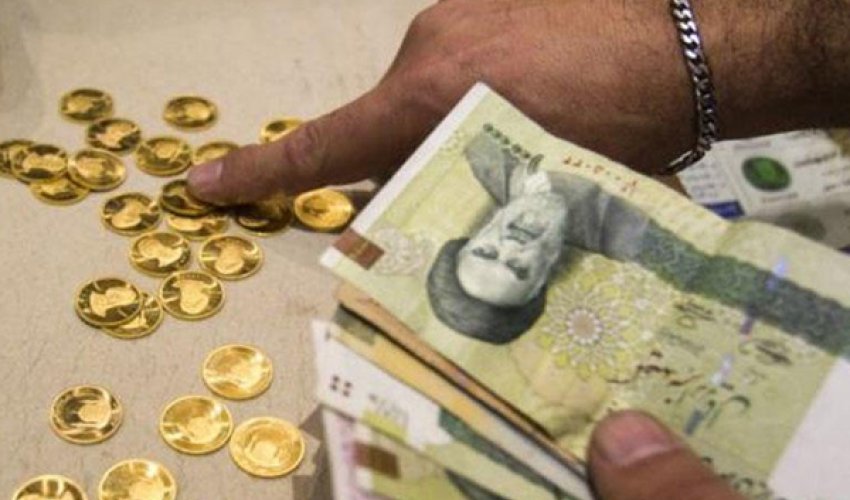 Ruhani İran rialından dörd sıfrı silmək istəyir Ruhani İran rialından dörd sıfrı silmək istəyir