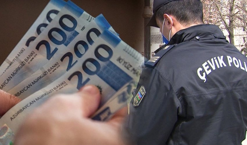 Polisə yaxınlaşıb pul istədi: Azərbaycanda gizli çəkilmiş video rekord qırır Polisə yaxınlaşıb pul istədi: Azərbaycanda gizli çəkilmiş video rekord qırır