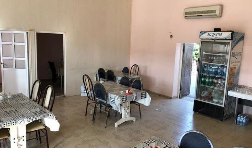Kafe sahibi və müştəriləri polis şöbəsinə gətirildi