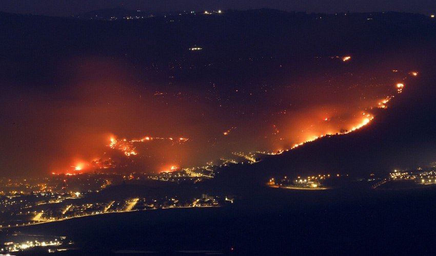 Fires rage in northern Israel after rocket attacks; key roads closed off Fires rage in northern Israel after rocket attacks; key roads closed off