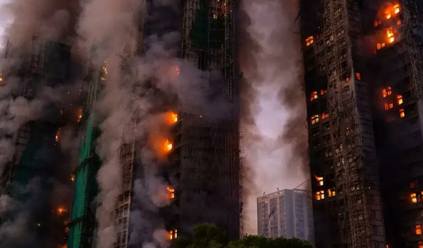 Число жертв пожара в Гонконге достигло 161