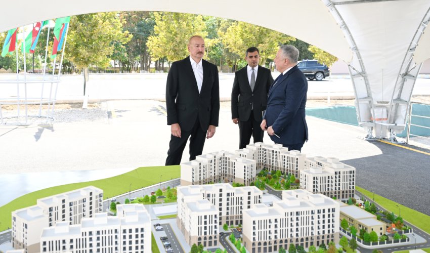 İlham Əliyev Naxçıvan şəhərində sosial evlər kompleksinin təməlini qoyub - Yenilənib