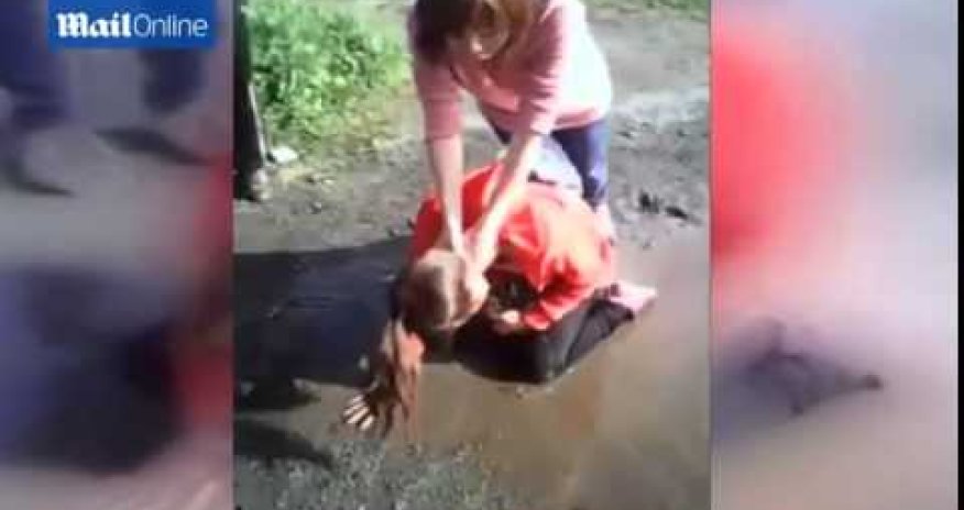 School bullies force girl to drink puddle water for being too pretty - PHOTO+VIDEO