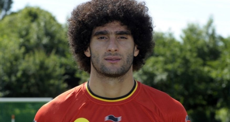 Marouane Fellaini chops off his famous afro