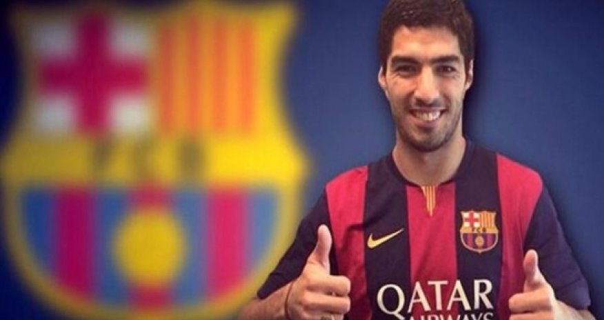 Suarez touches down in Spain to sign Barcelona deal