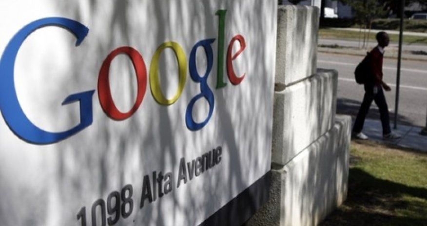Google revenue helped by ads as business boss leaves
