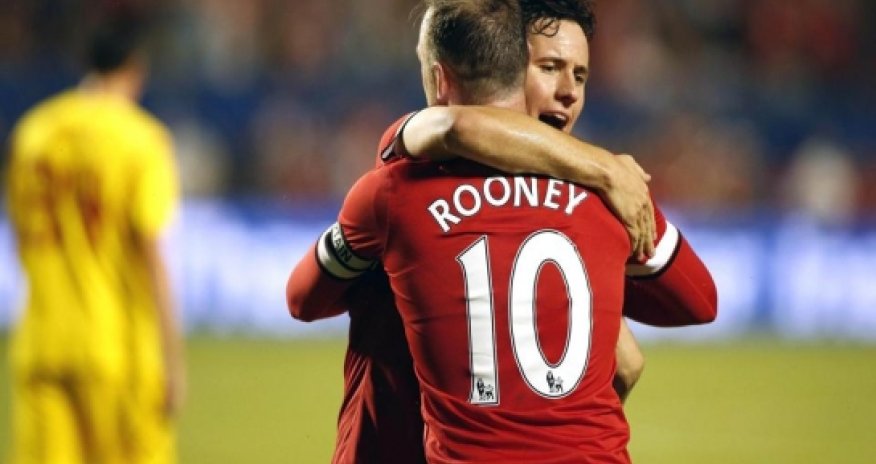 Captain Rooney leads United to win over Liverpool