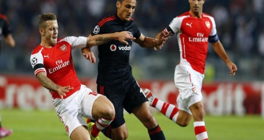 Ramsey sent off, but Arsenal earn draw in Istanbul