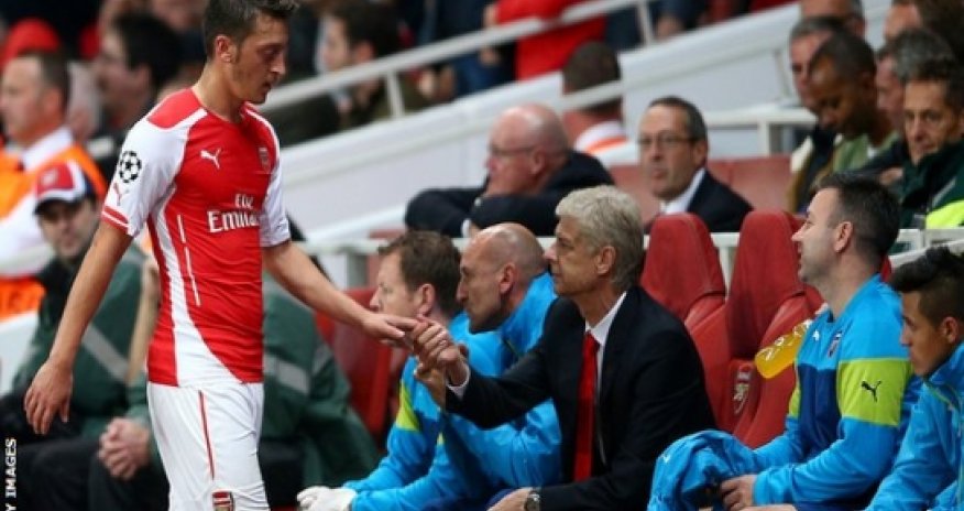 Mesut Ozil: Arsenal midfielder out with knee injury for up to 12 weeks