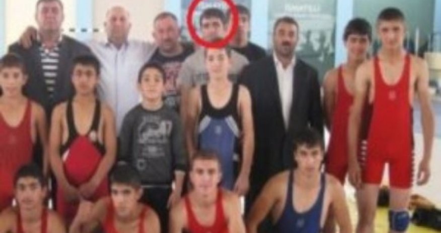 Why did an Azerbaijani wrestling champion join IS?