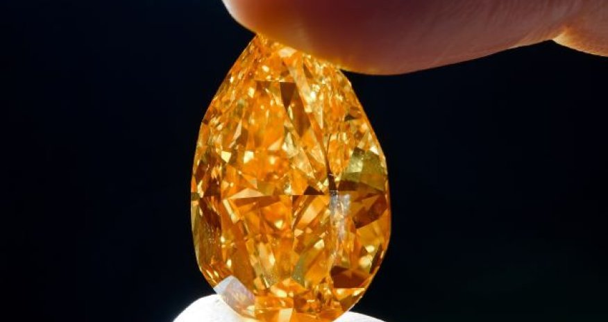 Rare orange diamond sold at auction for £22million - PHOTO