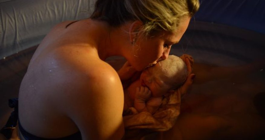 Body-builder mother gives birth to healthy baby boy - PHOTO