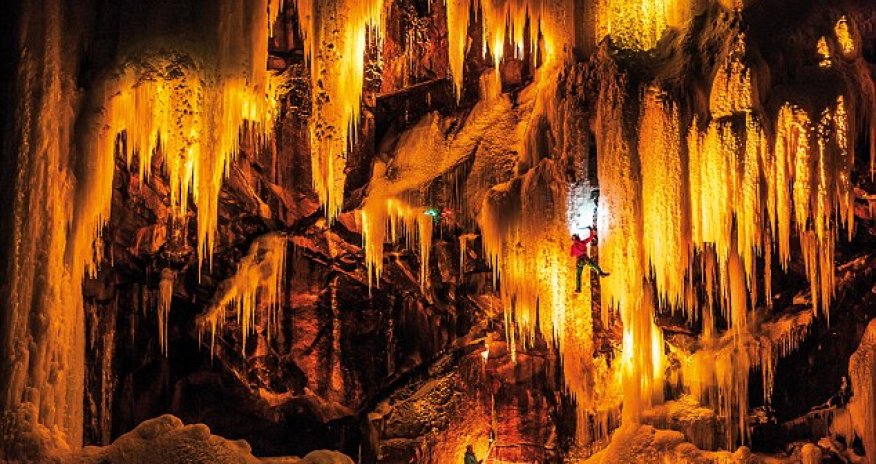 Climbers are captured dangling from frozen waterfalls - PHOTO