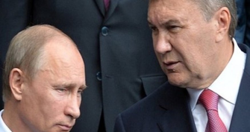 Ukraine leader 'seeks loans' in Russia, amid pro-EU rallies