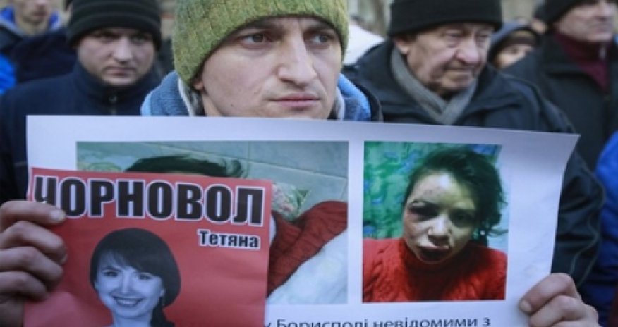 Ukraine activist beating: Three held