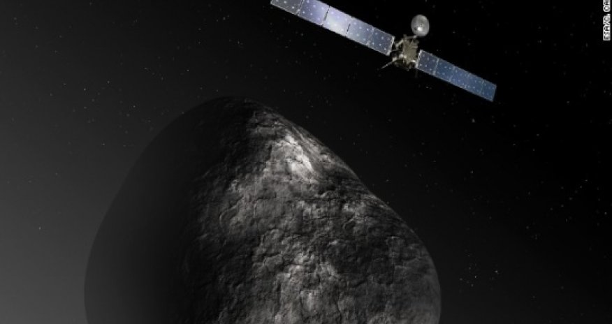 Comet-chasing probe wakes up, calls home - PHOTO