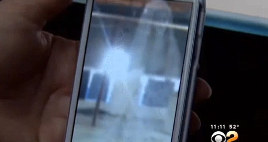 Pastor believes ghostly veiled figure is a 'sign from God' - PHOTO