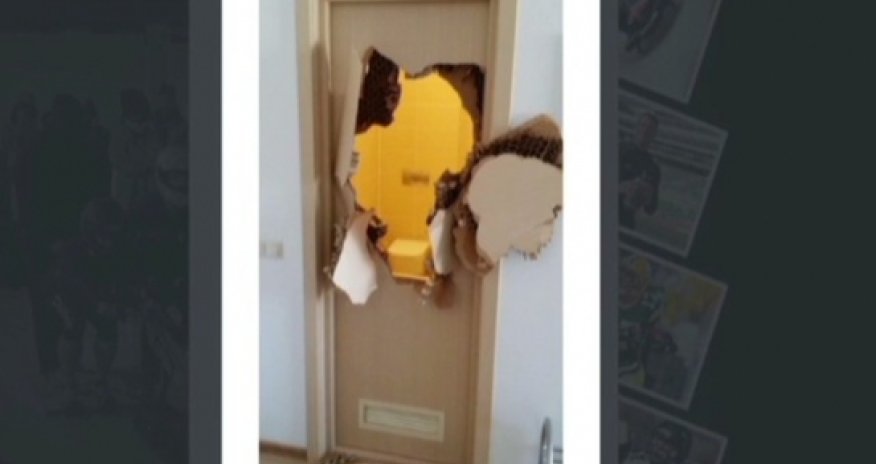 Trapped in Sochi bathroom, bobsledder punches hole in door