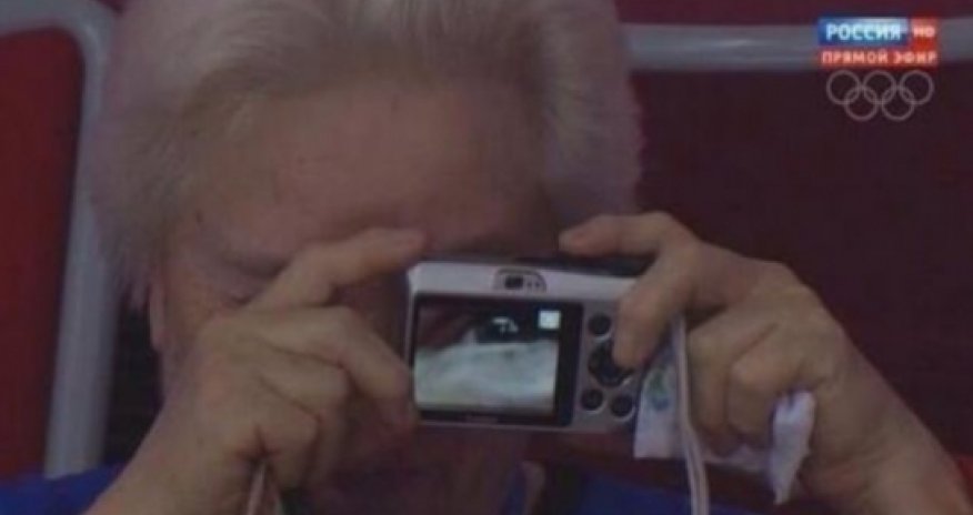 Elderly spectator snaps all the action at Sochi