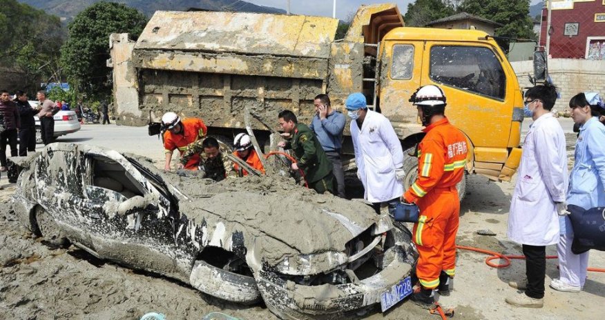 Woman dragged alive after being buried under wet cement for 40 minutes - PHOTO