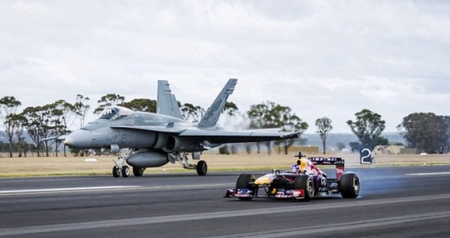 Formula One race car takes on F-18 Hornet fighter jet - PHOTO+VIDEO