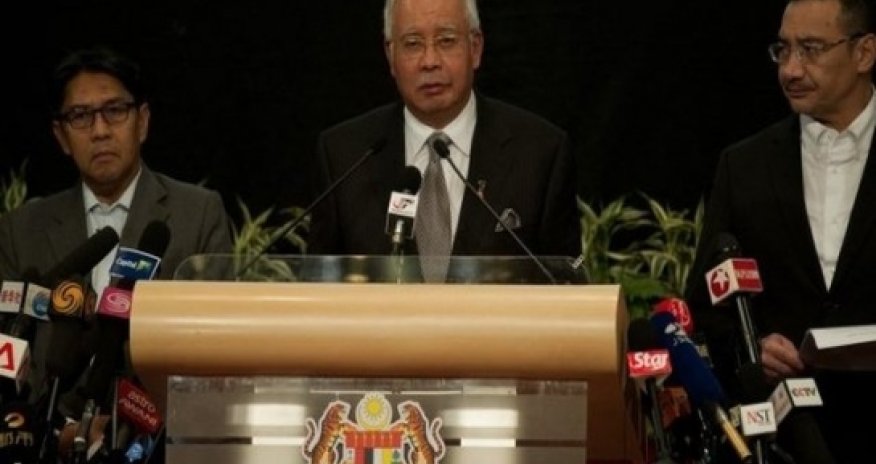 Bad weather halts search for flight MH370