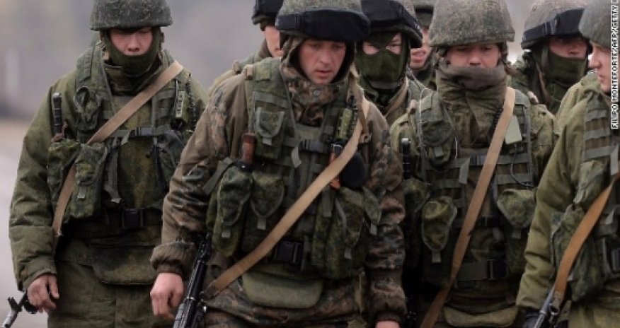 Germany: Putin says he's pulling some troops back from Ukrainian border